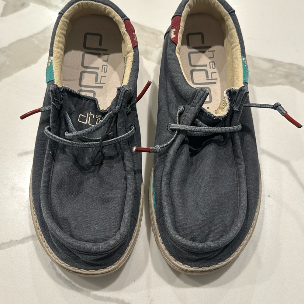 Never worn Hey Dude navy in color